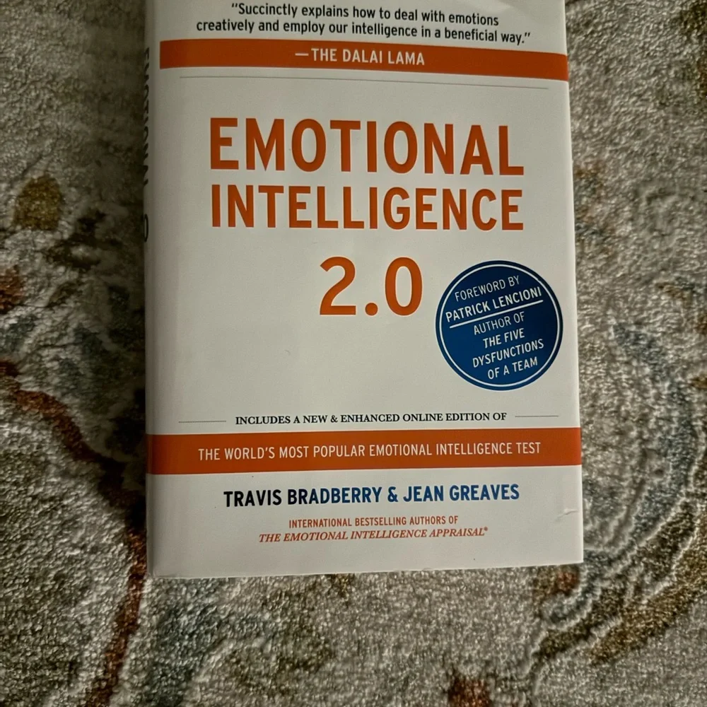 Emotional Intelligence 2.0 hardcover Book - White & Orange